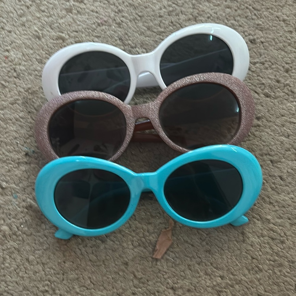 white, rose gold , and blue clout goggles